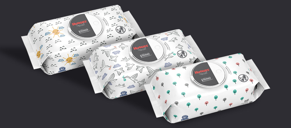 Three packages of Huggies Special Delivery Wipes with assorted designs