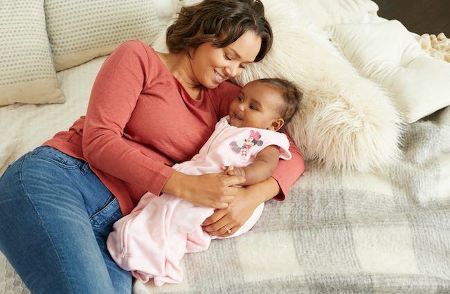 mom holding baby girl