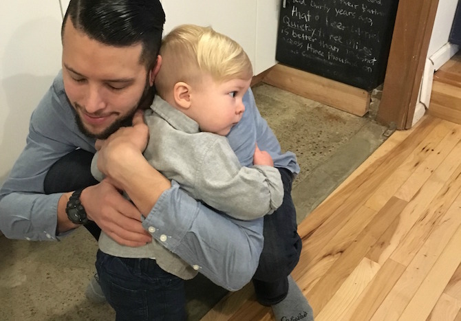Dad and son hugging