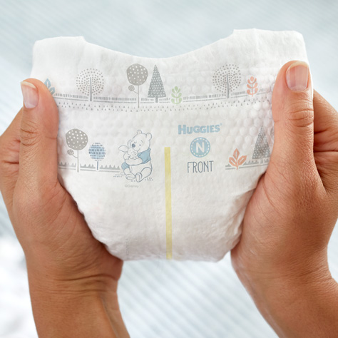 Hands holding diaper