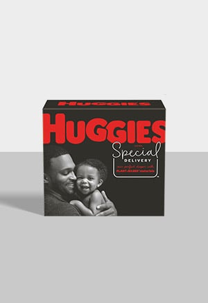 A box of Huggies Special Delivery diapers with a gray background