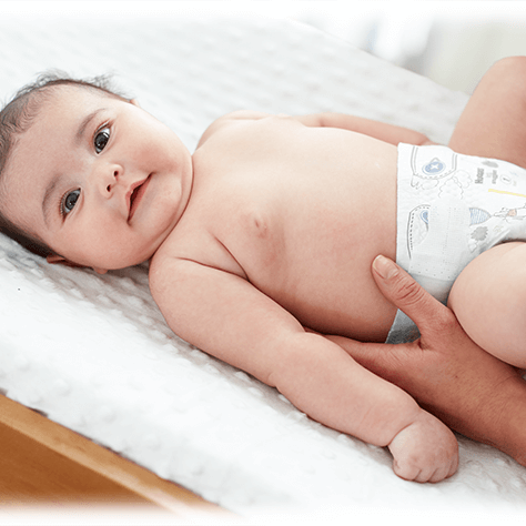 Baby being diapered by mom
